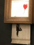 cropped-banksy2.jpg